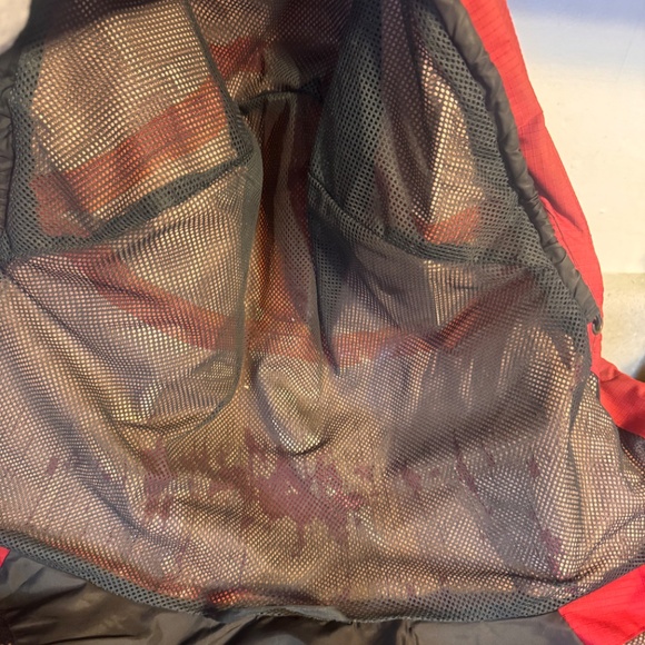 Experience warmth with Helly Hansen's vibrant red and charcoal jacket. Ideal for - Picture 12 of 12